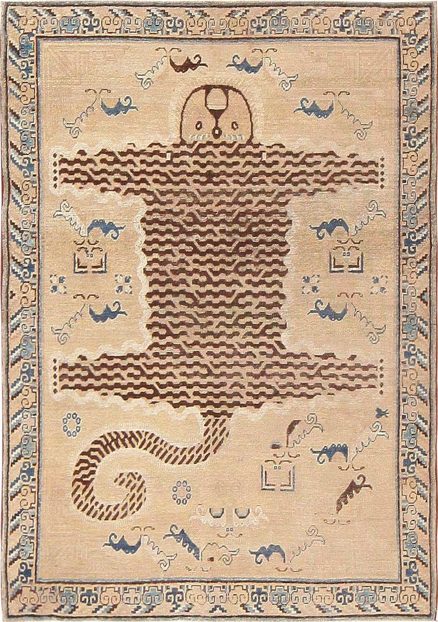 Antique Tiger Design Khotan Carpet From East Turkestan