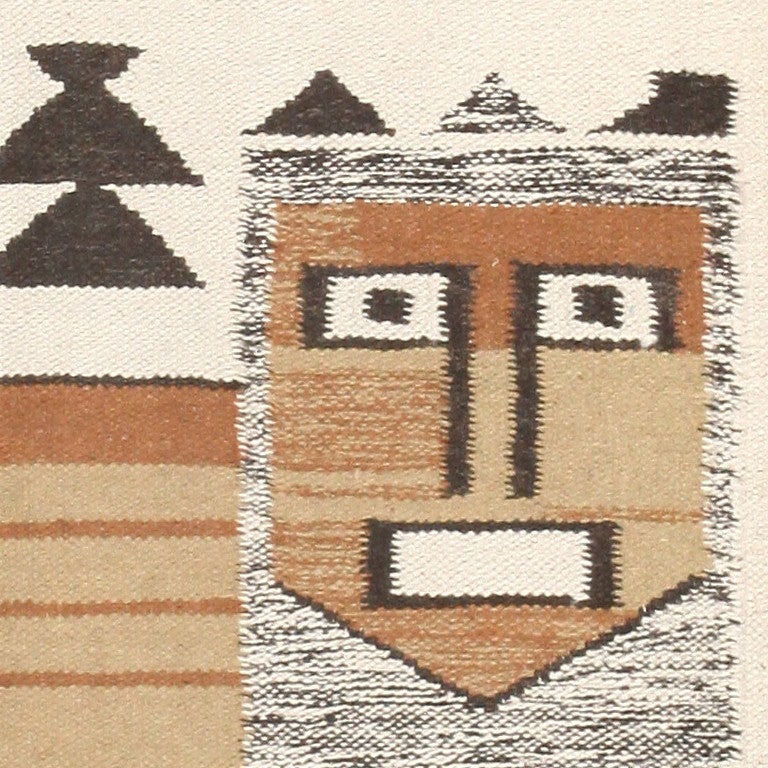 Vintage Mid Century modern Scandinavian Kilim rug, Country of Origin: Sweden, Circa date: 1950’s. Size: 3 ft x 3 ft 2 in (0.91 m x 0.97 m)

This small Scandinavian rug with a large picture of a lion is designed with a variety of bold, geometric