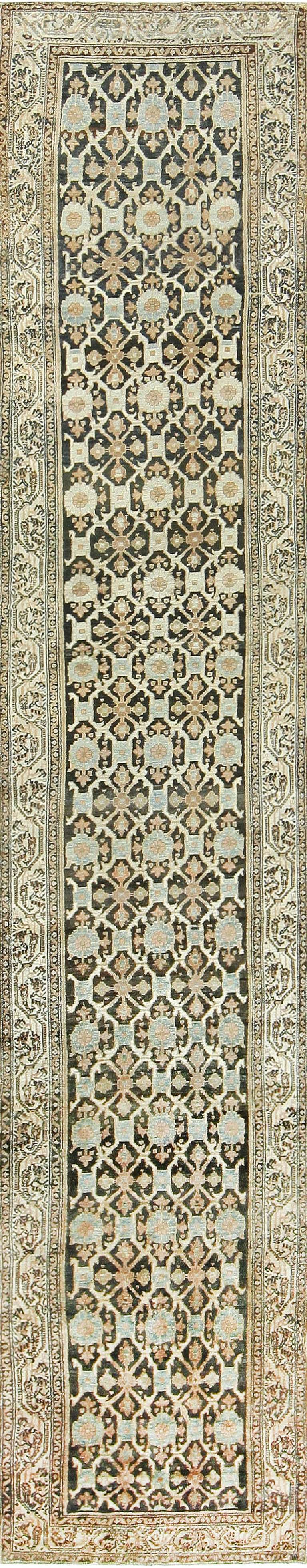 Antique Persian Malayer Rug, Country of Origin: Persia, Circa Date: 1920. Size: 3 ft 2 in x 15 ft 6 in (0.97 m x 4.72 m)

The Malayer rugs of Northern Persia are unique compositions, finely straddling the line between the more ornate carpets of