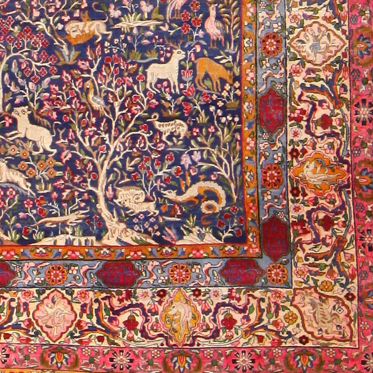 Antique Garden of Paradise Persian Carpet, Persia, 1900 -- This Antique Garden of Paradise Persian Carpet is steeped in intricacy and imagery. The artisans that crafted this piece truly made it feel like a thriving and bustling garden - a microcosm