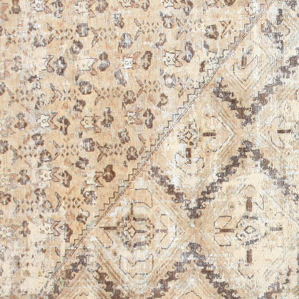 Antique Malayer Carpet, Persia, 1900 -- From the soft, angular patterns to the gently laid colors and details, this antique carpet from Persia showcases the best of understated elegance. A smooth, creamy taupe sets the background for the entire