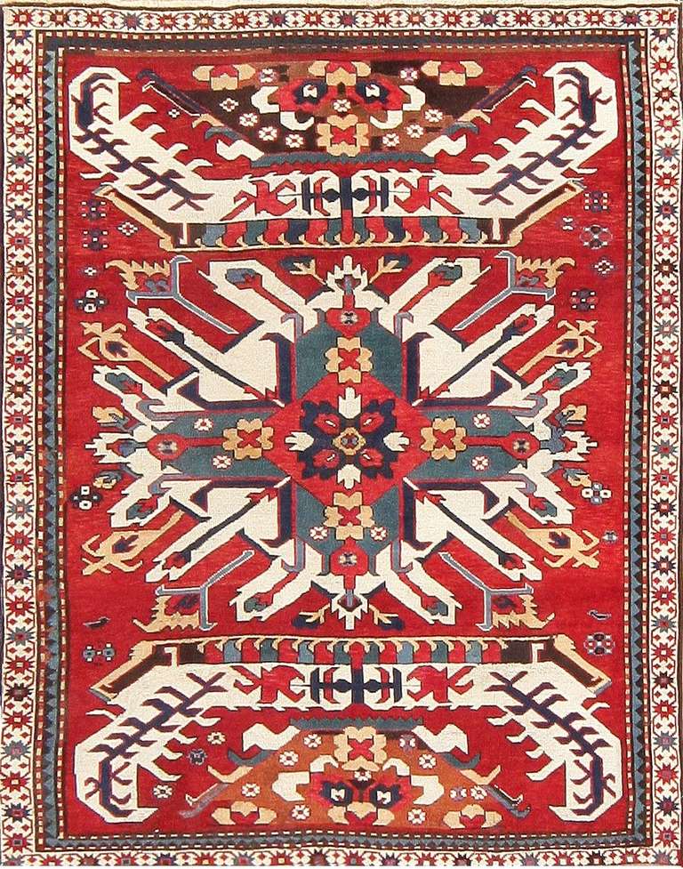 Antique Caucasian Eagle Kazak rug, Caucasus, circa last quarter of the 19th century. Here is a dynamic and exciting antique Oriental rug, an antique Eagle Kazak rug, woven by the inimitable tribal weavers of the Caucasus toward the end of the 19th