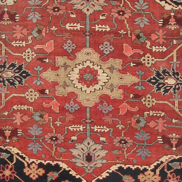 Antique Persian Heriz Serapi Carpet, Persia, Date. Here is an absolutely gorgeous antique Oriental rug - an antique Persian carpet, woven in the Heriz Serapi style by the inimitable weavers of that famed rug-producing region. An exceptional piece,
