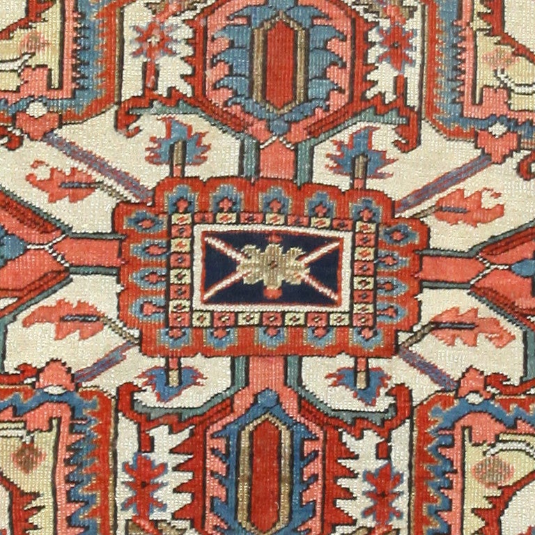 Antique Heriz Rug, Country of Origin: Persia, Circa 1900 --  True to all Heriz rugs, this one exemplifies the best of attractive flows and movements, represented through angular figures and twists. Contrast is created throughout the antique rug