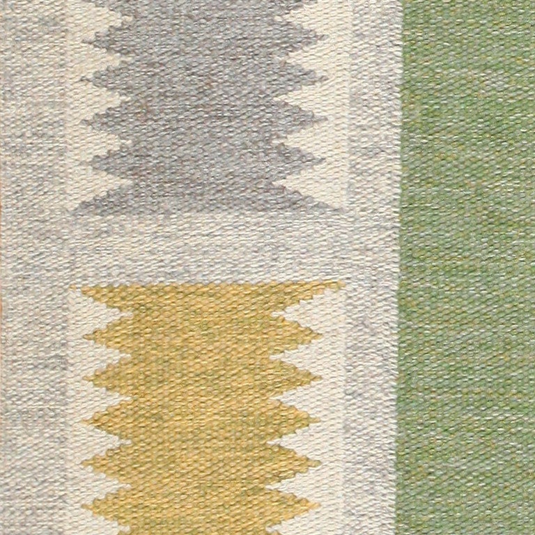 Vintage Kilim by Birgitt Sodergren, Sweden, Mid 20th Century --  Much like most traditional Swedish rugs, this one features a very simple color scheme and pattern that allows the abstract themes within to shine through. A large, steely gray border