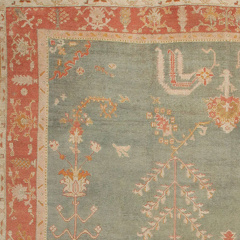 This exceptional beautiful and reserved antique Oushak has a delicate design of flowering vines and willow branches derived from classical Persian â??Garden Carpets.â??

This exceptional beautiful and reserved antique Oushak has a delicate design