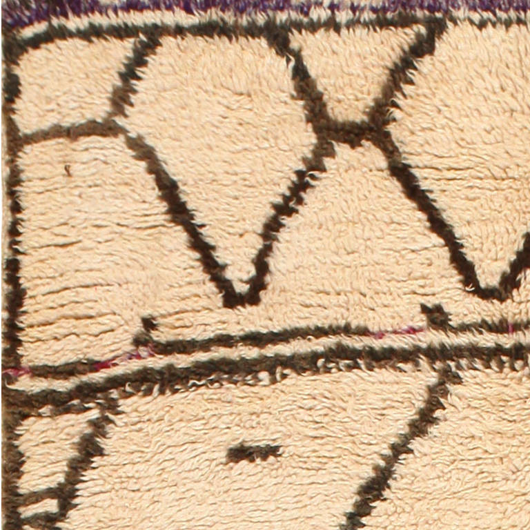 Vintage Beni Ourain Moroccan carpet, Morocco, mid-20th century. Here is an exciting and dynamic vintage carpet - a Mid-Century Moroccan rug, woven in the perennially popular Beni Ourain style. Characterized by the typical Beni Ourain ivory field,
