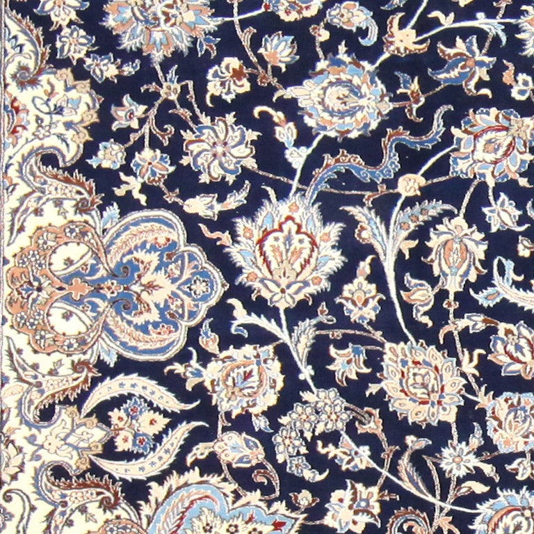 Vintage Nain carpet, Origin: Persia, circa Mid-20th century. A striking vista of color and form greets the viewer, with intricate details present at every corner of the piece. While the Nain carpet only uses a few primary colors throughout, these