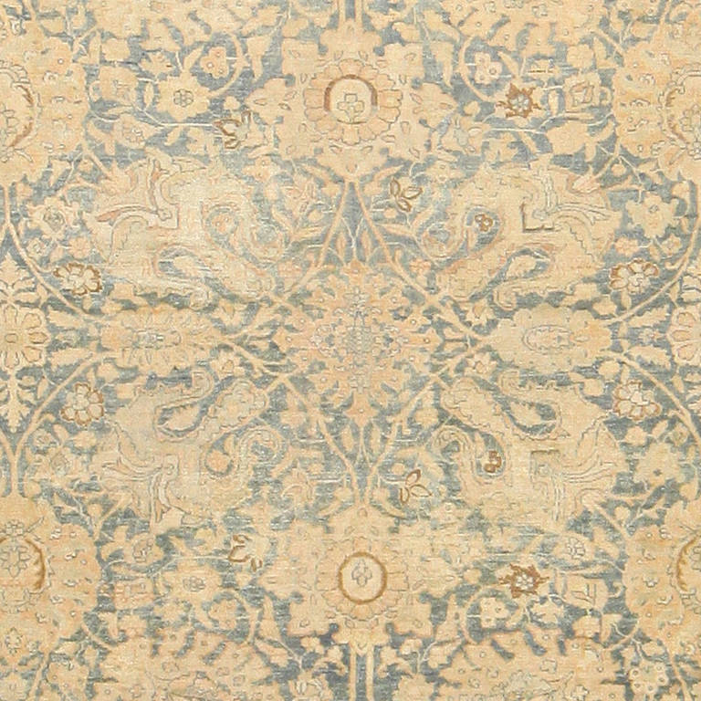 Antique light blue Persian Tabriz rug, Persia, circa turn of the 20th century. Here is a majestic, classically composed antique Oriental rug, an antique Tabriz carpet, woven in Persia around the turn of the 20th century. Tabriz rugs are among the