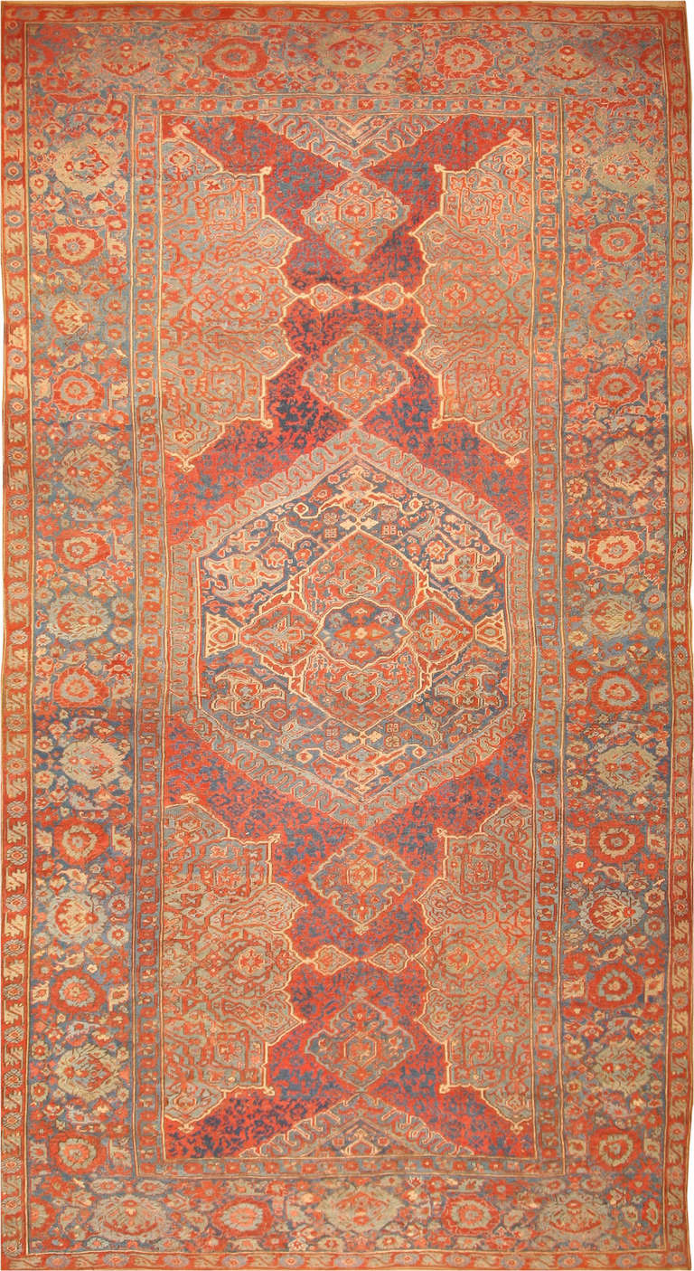 Antique Oushak Gallery carpet, Turkey, 18th century.

A classical medallion design with lavish arabesque detail unfolds with meticulous precision and rich saturated color on this stunning early Oushak, directly descended from the Ottoman court