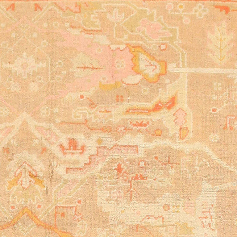 Antique Turkish Oushak carpet, origin: Turkey, circa turn of the 20th century, here is an impressive and elegant antique oriental rug, an antique Oushak carpet, woven in Turkey around the turn of the twentieth century. This splendid example is