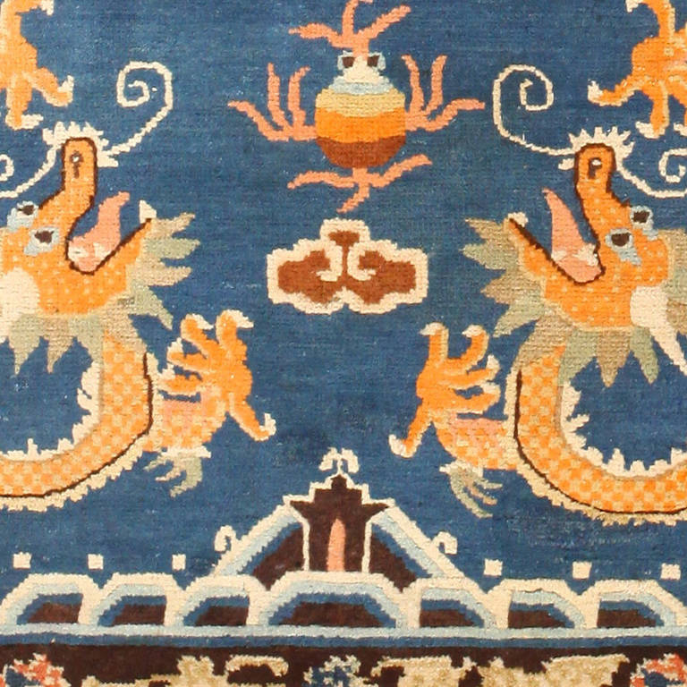 Antique Chinese Rug, Origin: China, Circa:  Turn of the 20th Century - Here is a compelling and exciting antique Oriental rug - an antique Dragon rug, woven in China around the turn of the twentieth century. Vibrant and beautifully preserved, the