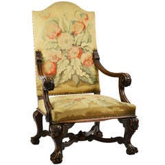 French Carved Walnut Tapestry Armchair with Putti