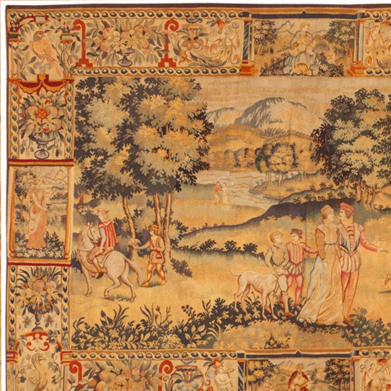 The age of chivalry lives on in the wild and untamed European landscape and the regal, sophisticated composition of this splendid antique Flemish tapestry.

Antique Flemish Tapestry, Origin: Belgium, Circa: Late 19th Century – This enrapturing
