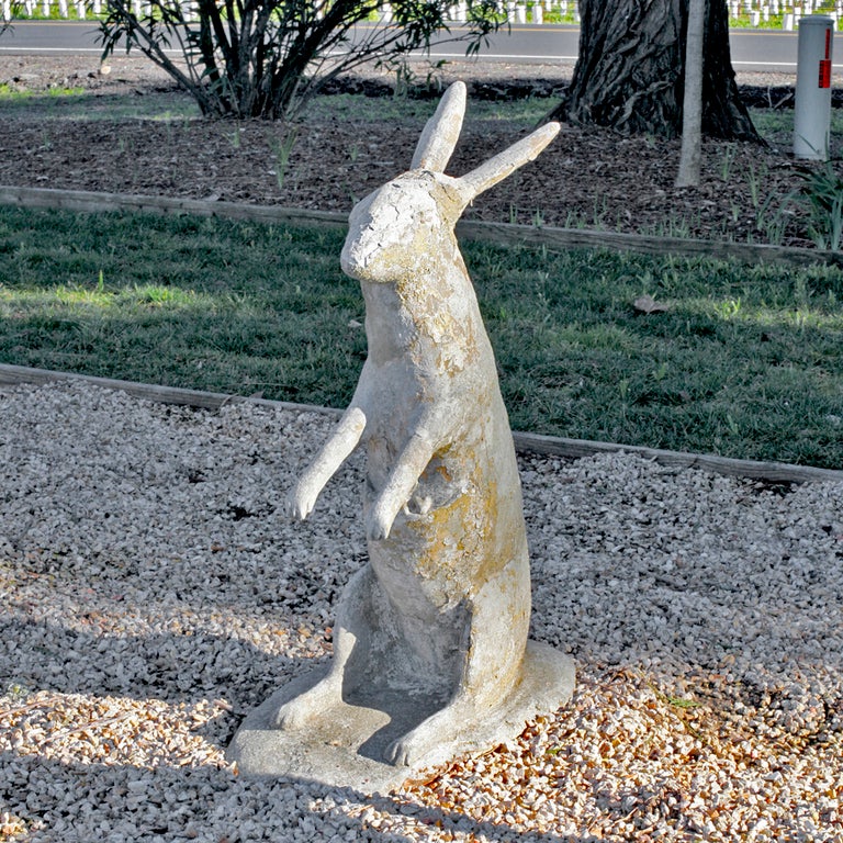 Vintage French "art popular" cast stone sculpture of a wallaby or small kangaroo for garden. Please see images for details of patina and joey in the pouch. 


