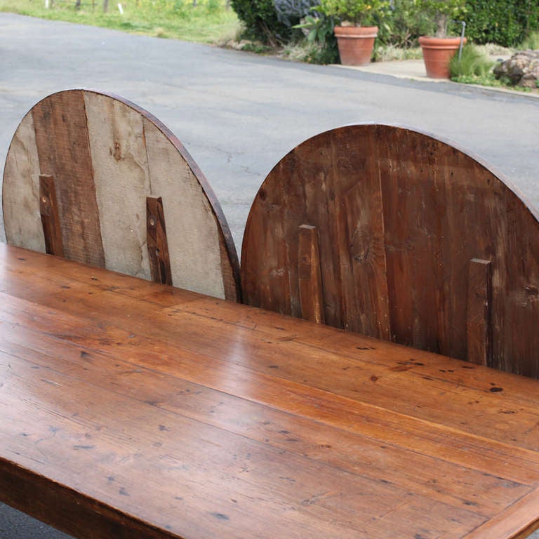 French country dining table with possibly original demi-lune style extensions. The extensions are a perfect match. Pine top with cherry wood bottom. The table is structurally sound with a great patina.

Measurements: Width with leaves: 149 3/4