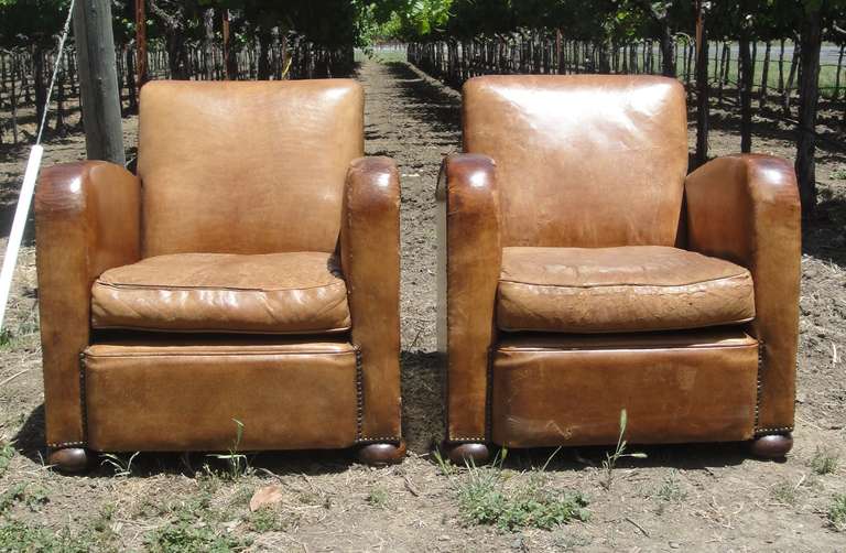 1930's leather club chair set. Wear consistent with age and use. Priced individually.
