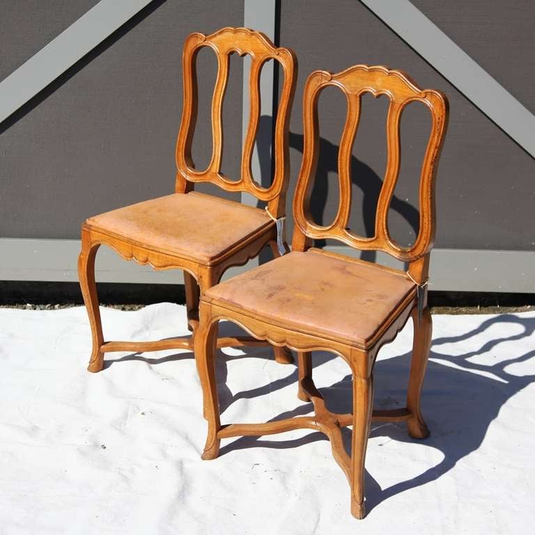 Vintage Beechwood dining chairs with original leather upholstery. 