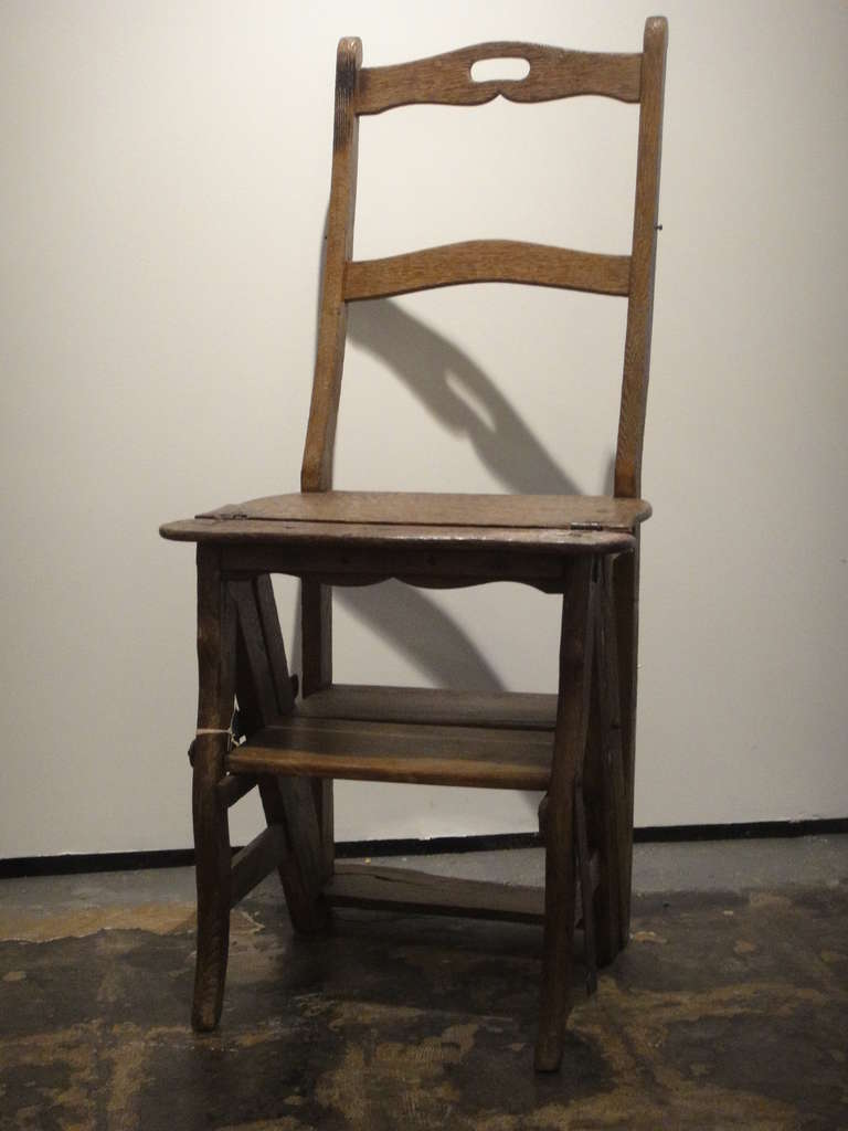 Vintage library chair that folds into step ladder.