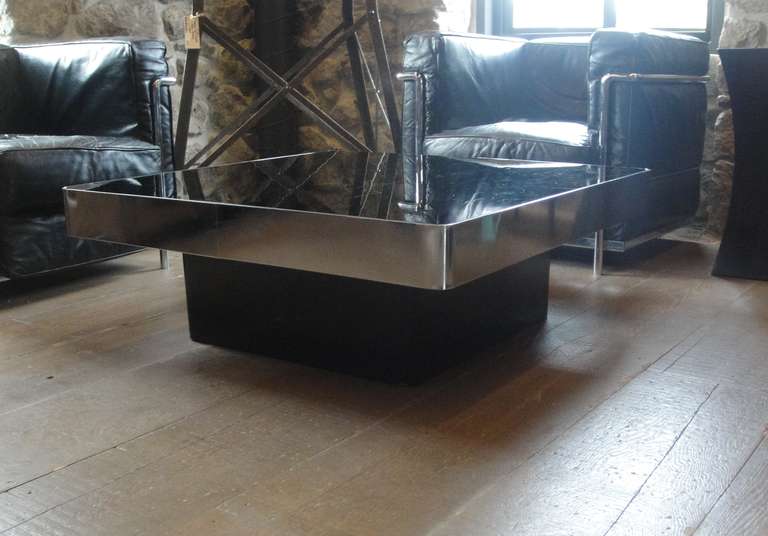 Pair of French "Mongouste" coffee tables made by Kappa,1973. Chrome detail perimeter, acrylic top and bottom. 

Minor scratches consistent with age.