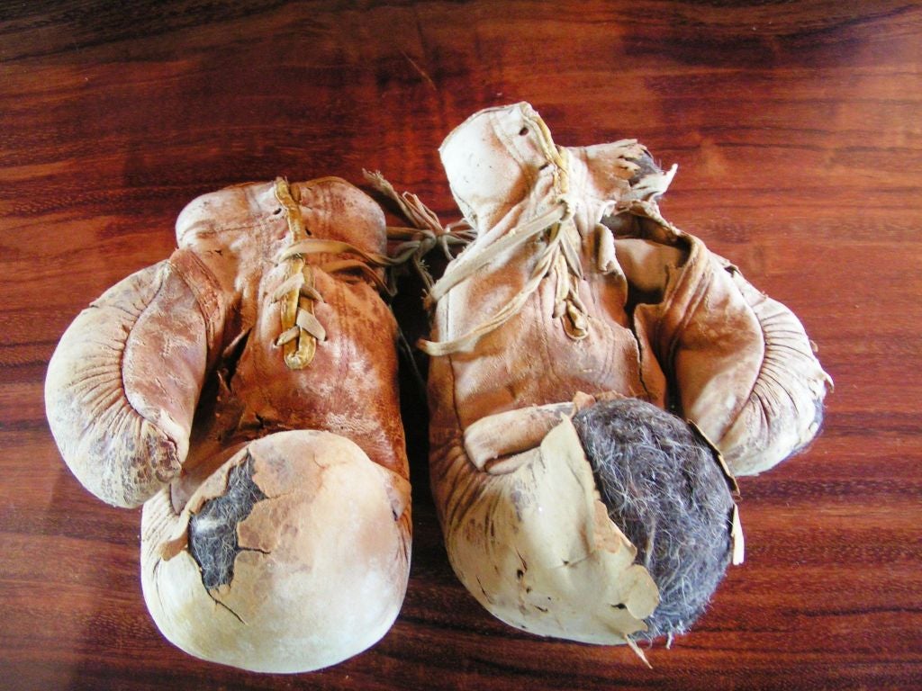 Circa 1910 leather and horsehair boxing gloves