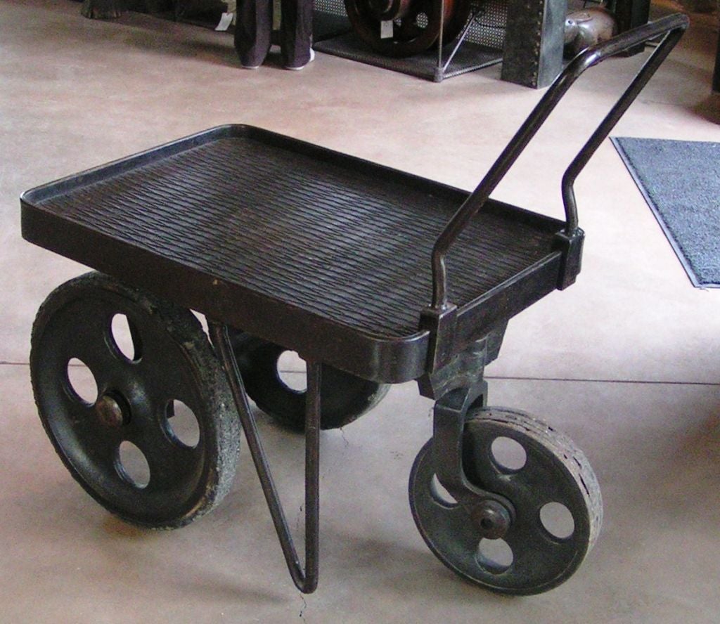 Metal three wheeled bank cart used to transport bullion, some wear on wheels.