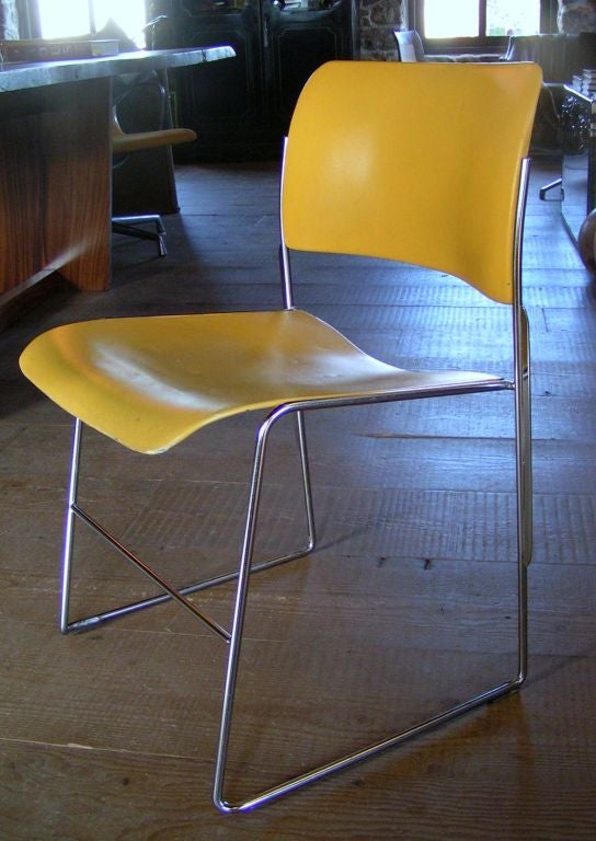 Chrome and yellow enamel David Rowland 40/4 stacking chairs.  8 chairs in total, sold individually.
