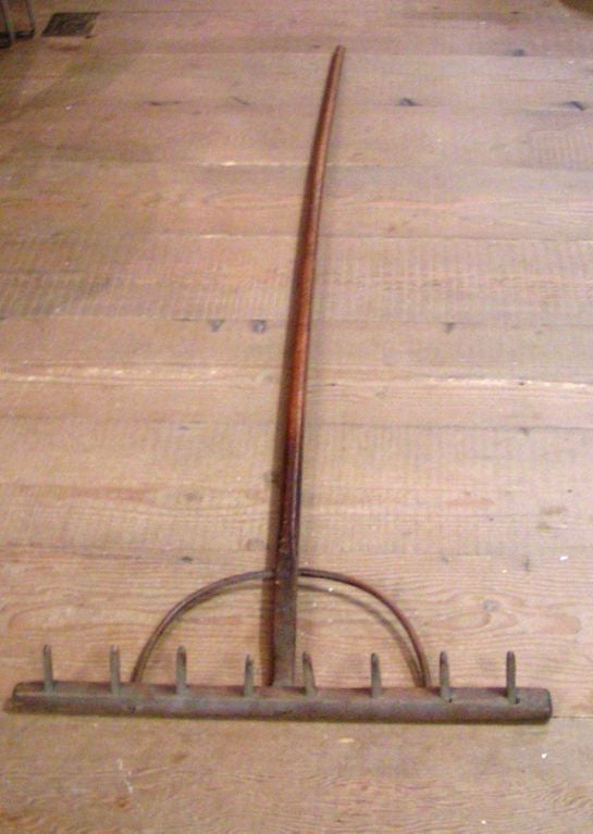 Early American antique hay rake.  Part of the Burgundy House Bed and Breakfast history in Yountville, CA.