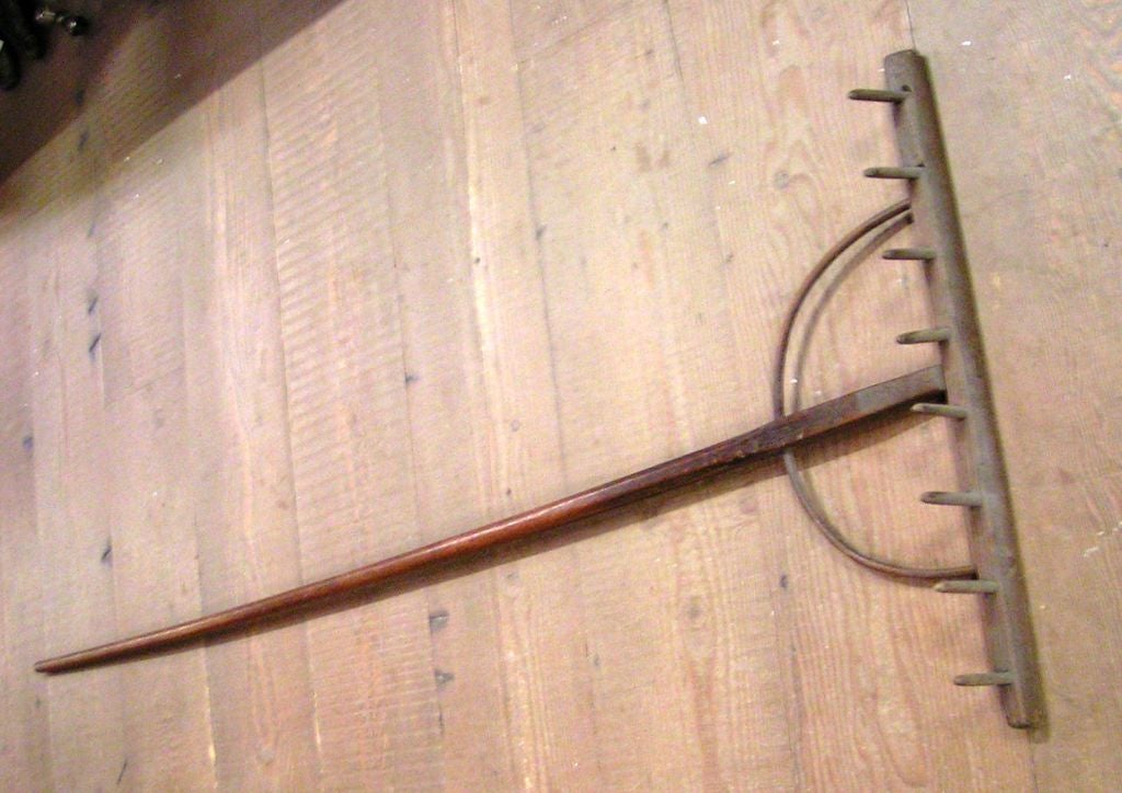 antique wooden hay rake