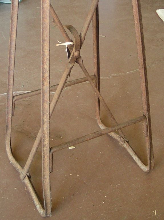 Antique artist's stand, France, circa 188. Has a small hook inside the framework of the legs where one could hang a painting palette. Vintage condition with minor wear consistent to age and use.
