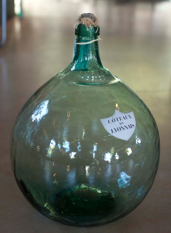 French hand blown glass Demijohn. Original labels with French AOC (Appellation d'Origine Contrôlée) wine growing regions. Original cork & stopper. Different sizes and shapes available. Medium $500 each, Large $600 each