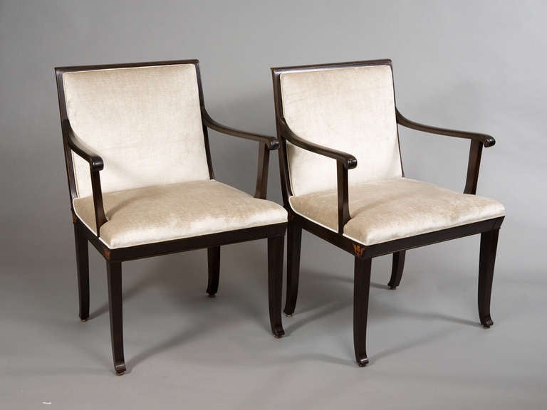 Pair of open armchairs with marquetry inlay accents by Carl Malmsten (1888-1972). Fully restored and newly upholstered.
Seat depth - 17.5