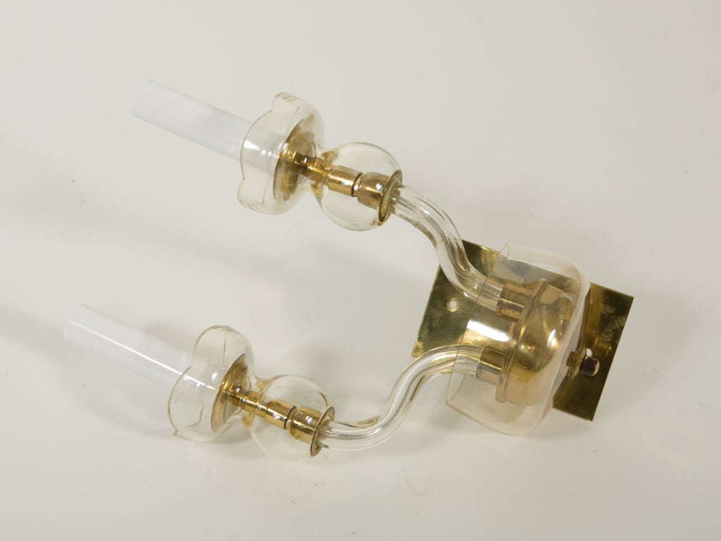 Pair of small Mid-Century glass and brass sconces.