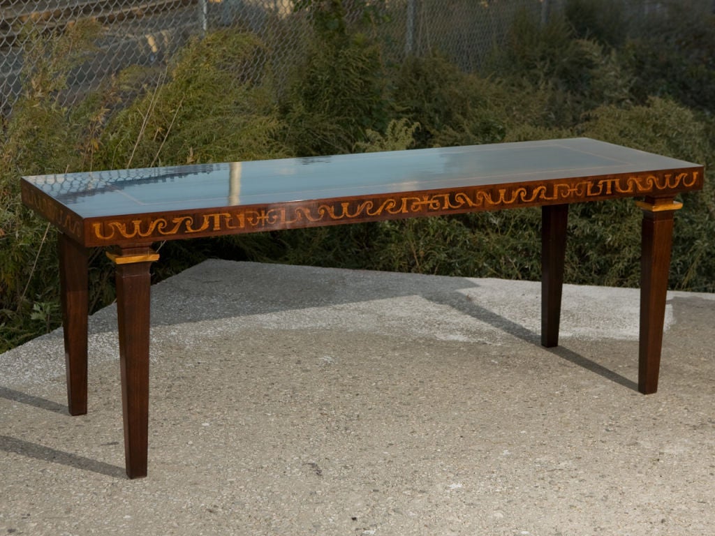 Monumental, Swedish marquetry inlaid console table designed by Carl Malmsten (1888 - 1972). Retailed by Nordiska Kompaniet. Marked with CM Brand, NK Disk.