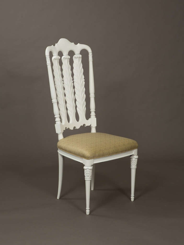 Set of 1940's stylized white painted Italian carved dining chairs with newly upholstered seats.
Seat depth - 16