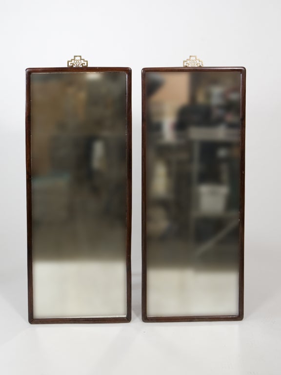 Great pair of Asian motif 19th century mirrors with rosewood frames and antique mirror plate.