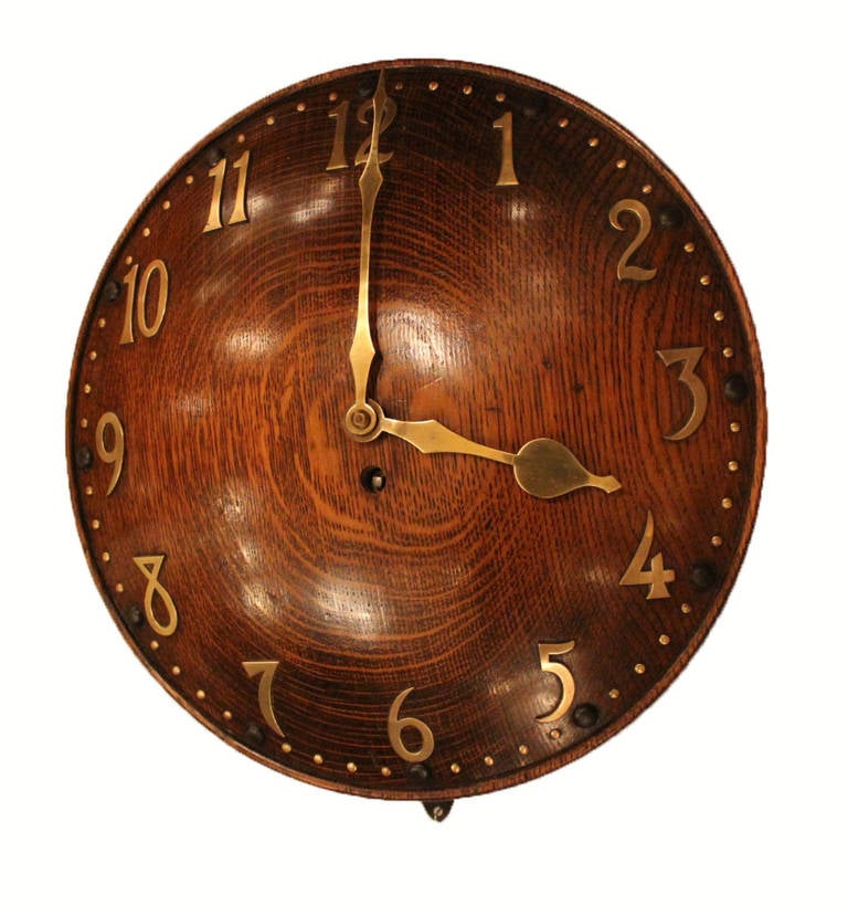Convex oak and brass with zenith movement

Rare early era Heals clock

Handpicked by buyers at Ann-Morris, Inc