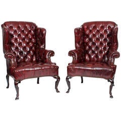 Pair of Red Leather Tufted Wing Chairs