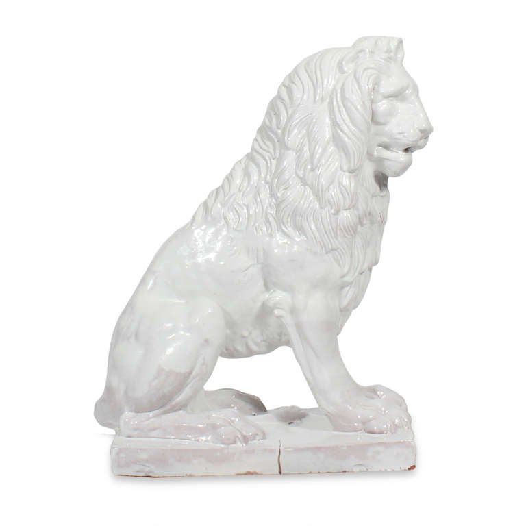 British Colonial Facing Pair of Early to Mid-20th Century Regal, Majolica Lion Figures For Sale