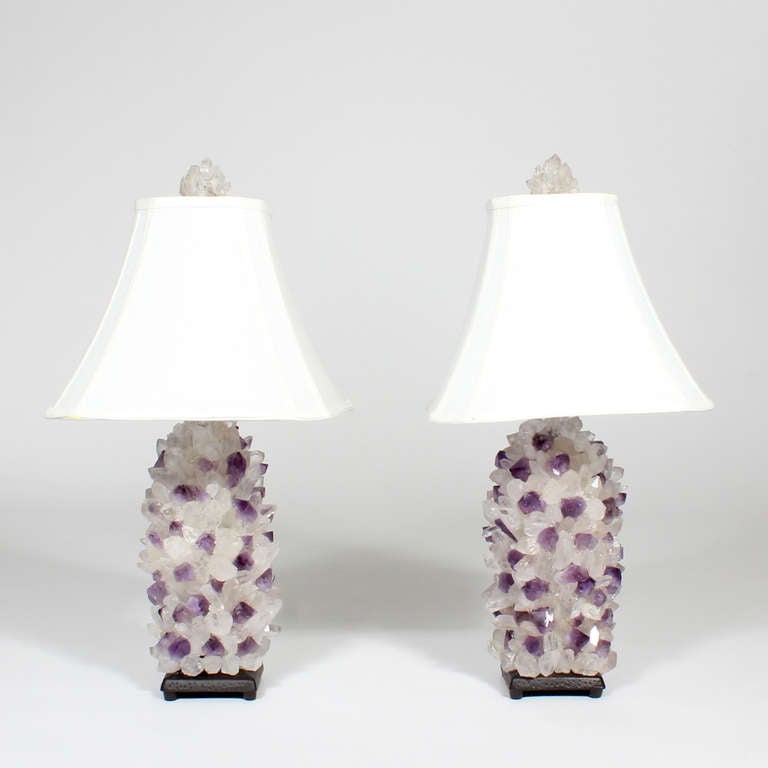 A pair of rock crystal and amethyst lamps, very well formed with metal bases, and quartz finials. Signed Arthur Court on the bases. Newly wired.

       