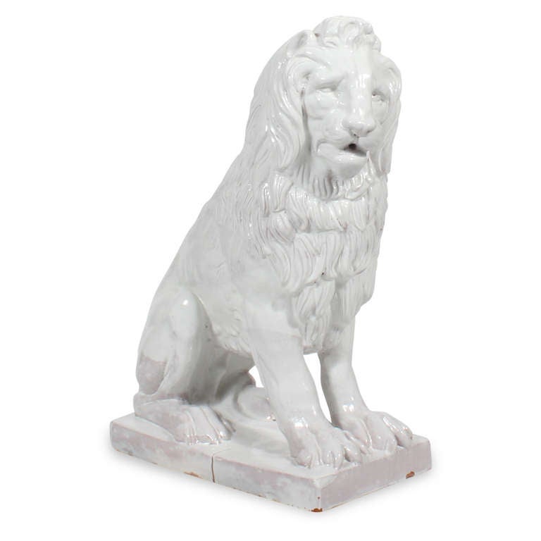 Italian Facing Pair of Early to Mid-20th Century Regal, Majolica Lion Figures For Sale
