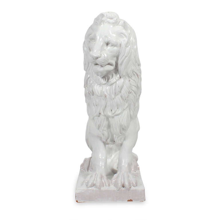 Hand-Crafted Facing Pair of Early to Mid-20th Century Regal, Majolica Lion Figures For Sale