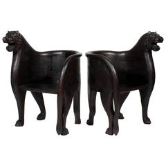 A Pair of Large Scale Lion Arm Chairs