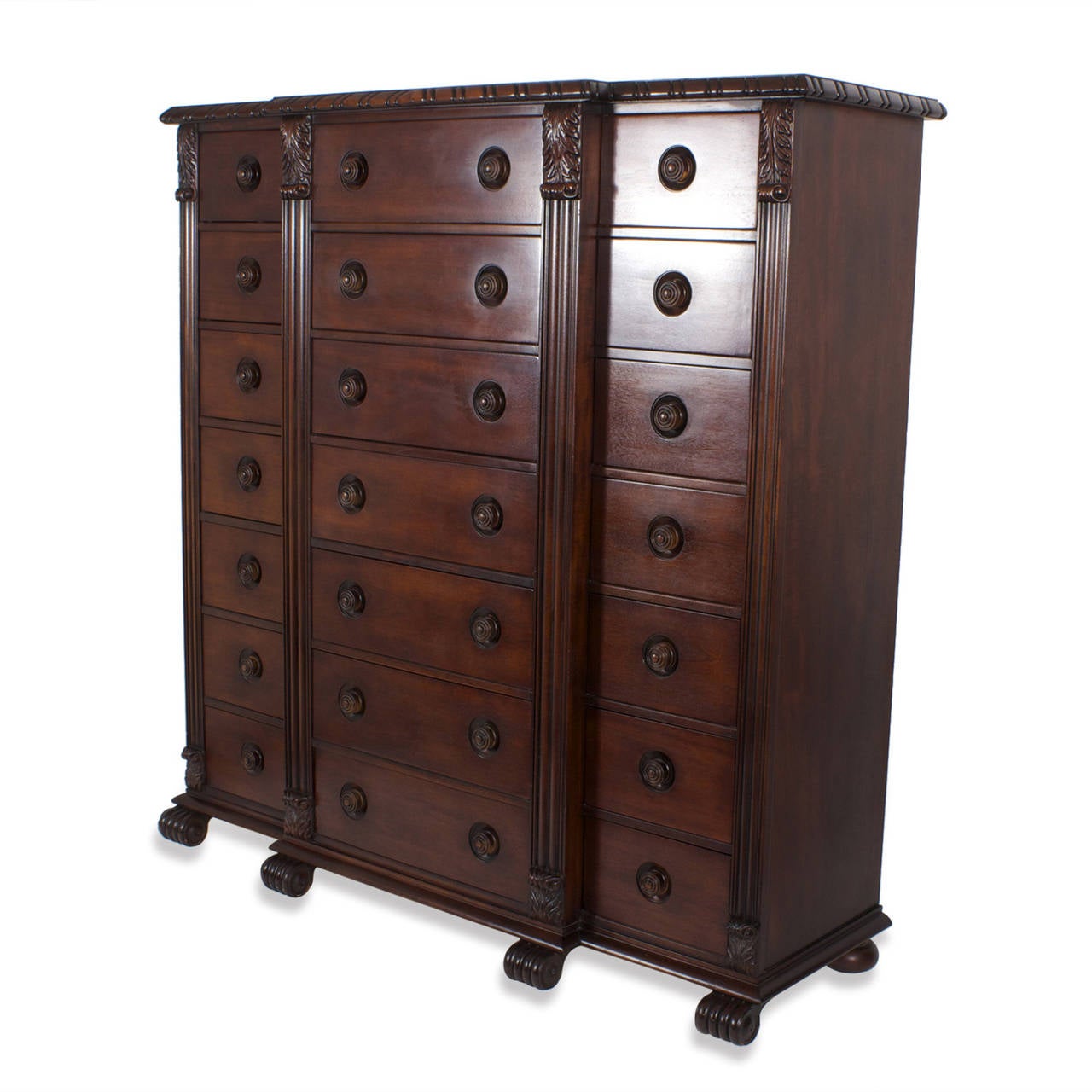 Ralph Lauren Polo gentlemans chest with 21drawers. Designed in a handsome regency style featuring Napoleonic columns and acanthus leaves all in mahogany with a bold manly scale. Ralph Lauren brass label in the upper right drawer.
Newly polished.
