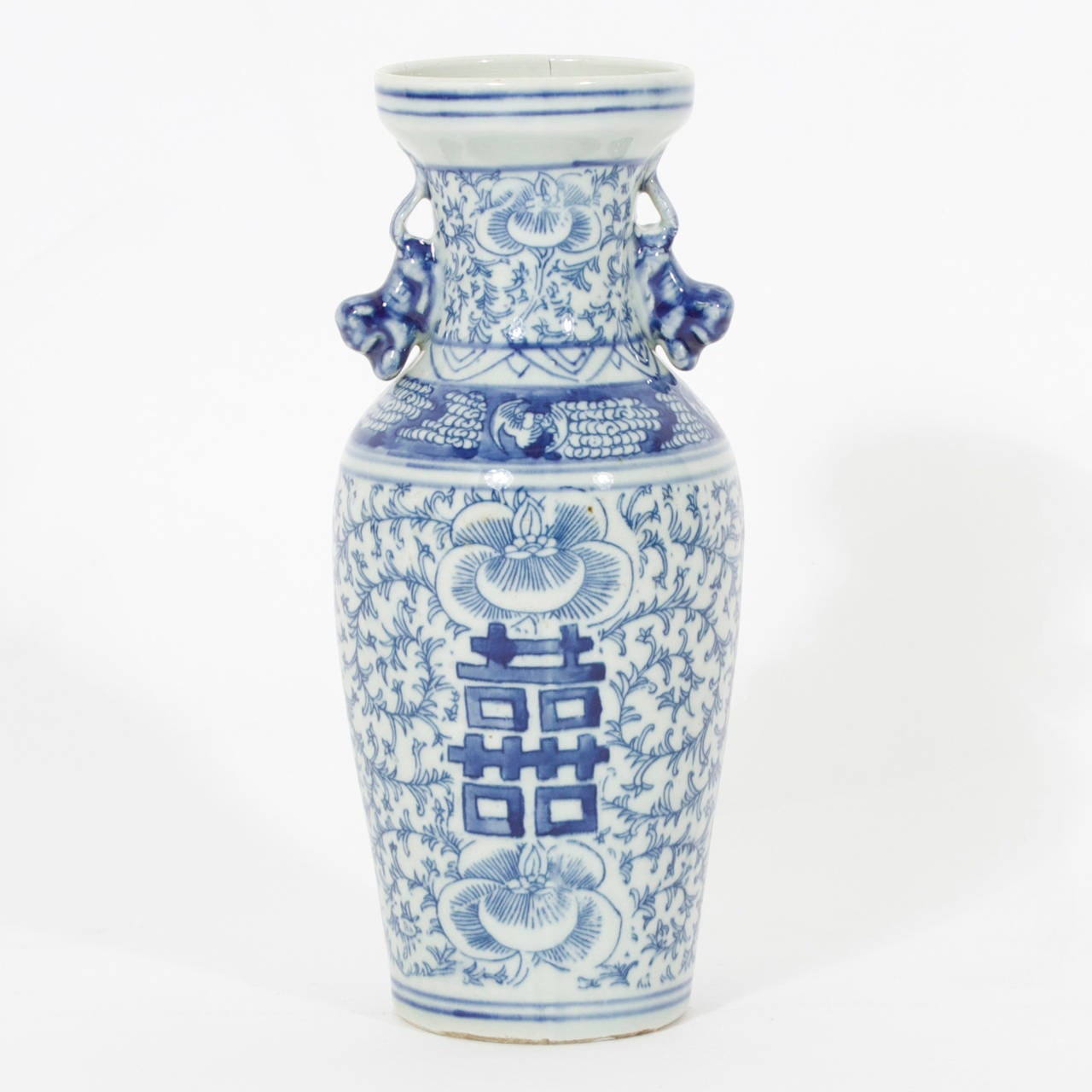 A pair of Classic shaped Chinese export blue and white vases with double happy motifs on a snapdragon and seaweed background. Nice vintage pieces.