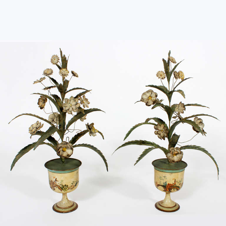 A pair of large painted tole flowering plants in Chinoiserie decorated pots, with a wonderful white grey aged surface on the flowers, and an aged green surface on the leaves. Extremely decorative with a 
