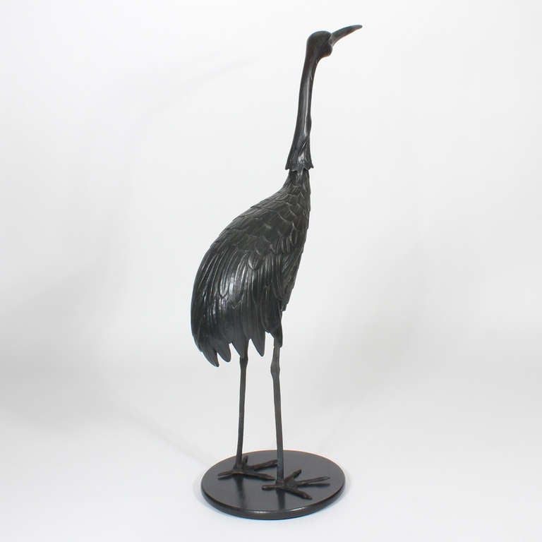 Pair of Lifesize Carved Wood and Stained Cranes For Sale at 1stdibs