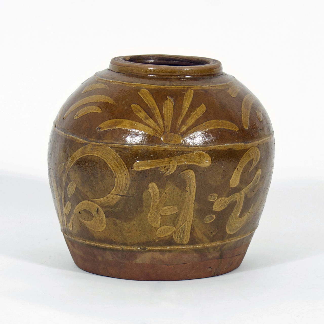 Terra cotta vase with brown, rustic glaze and decorated with Chinese characters and floral highlights, could be used in a traditional or modern interior.