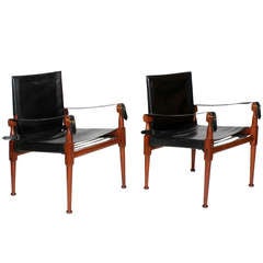 Pair of Rosewood Black Leather Campaign Chairs Labeled Hayat Bros.
