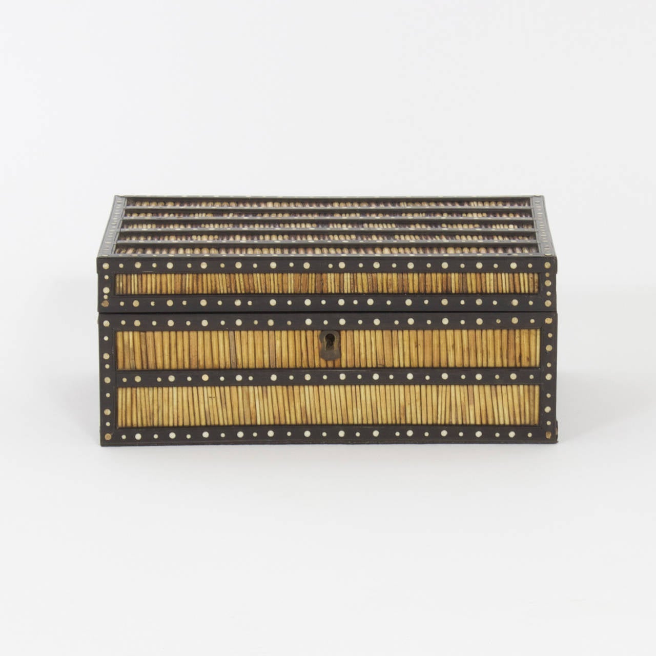Exotic Ceylonese or Anglo Indian porcupine quill box with all the intricate craftsmanship you would expect, including bone dots, 12 interior compartments in a separate removable container and hard wood frame. Queen Victoria owned one, you can too.